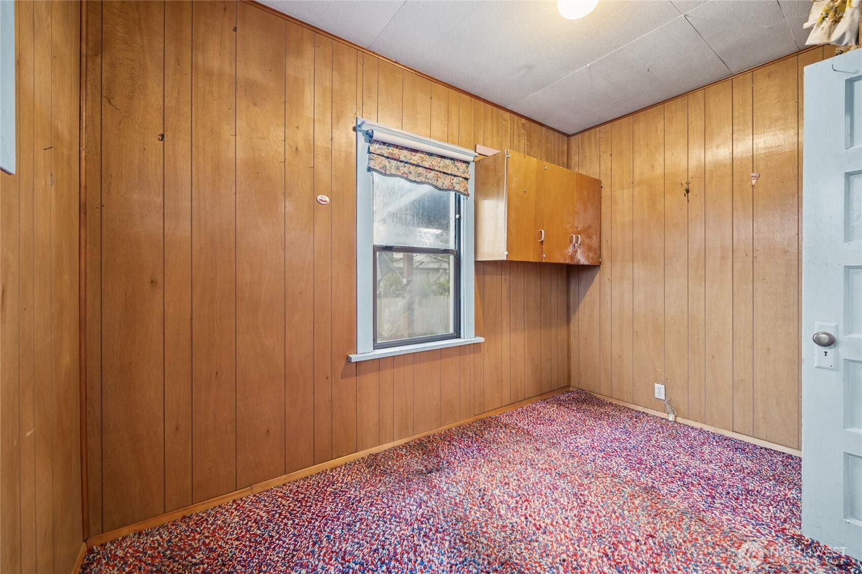 6931 South Tyler Street Tacoma, WA 98409 - Photo 8 of 20 a view of an empty room and window