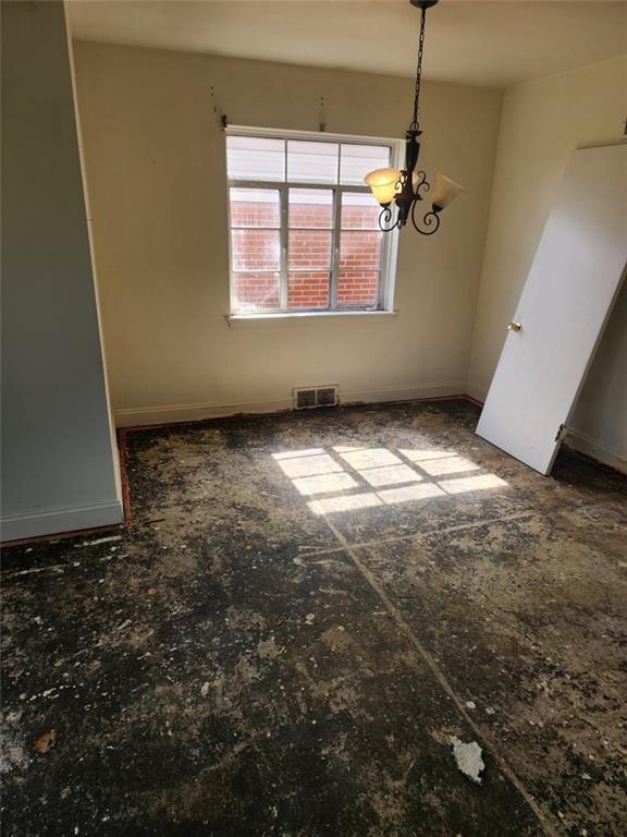 106 Larry Street Aliquippa, PA 15001 - Photo 3 of 14 a view of an empty room and window