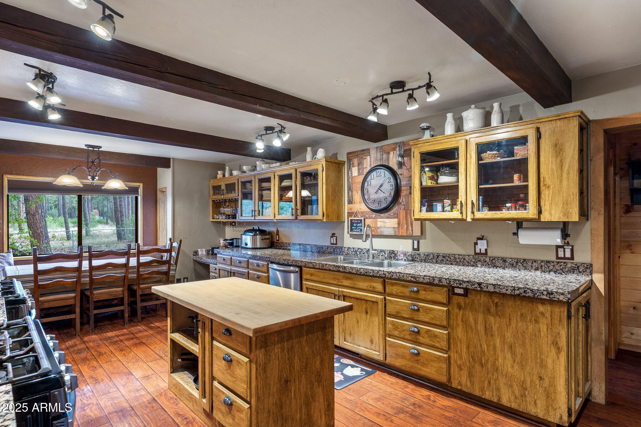 2444 South Jan Lane Pinetop, AZ 85935 - Photo 12 of 61 a open kitchen with stainless steel appliances granite countertop a stove and a sink
