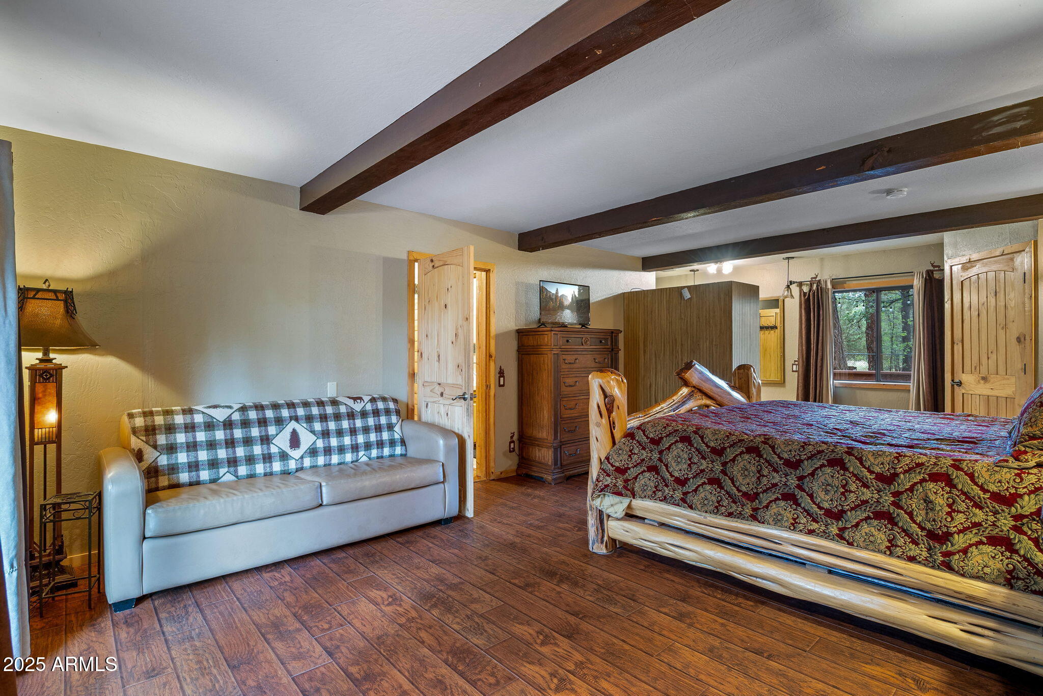 2444 South Jan Lane Pinetop, AZ 85935 - Photo 23 of 61 a bed room with furniture and window