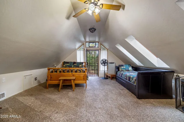 a view of a chairs and table in the patio