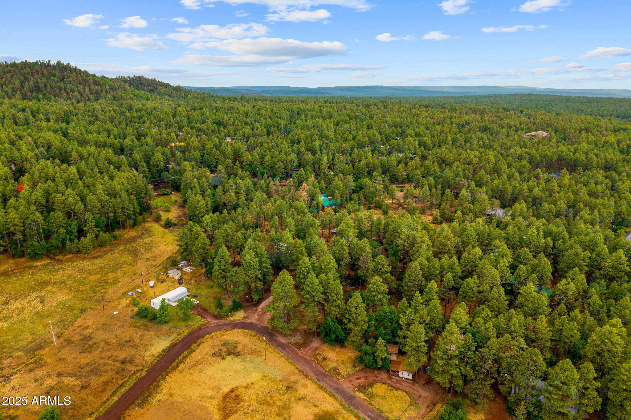 2444 South Jan Lane Pinetop, AZ 85935 - Photo 47 of 61 a view of an outdoor space and a lake view