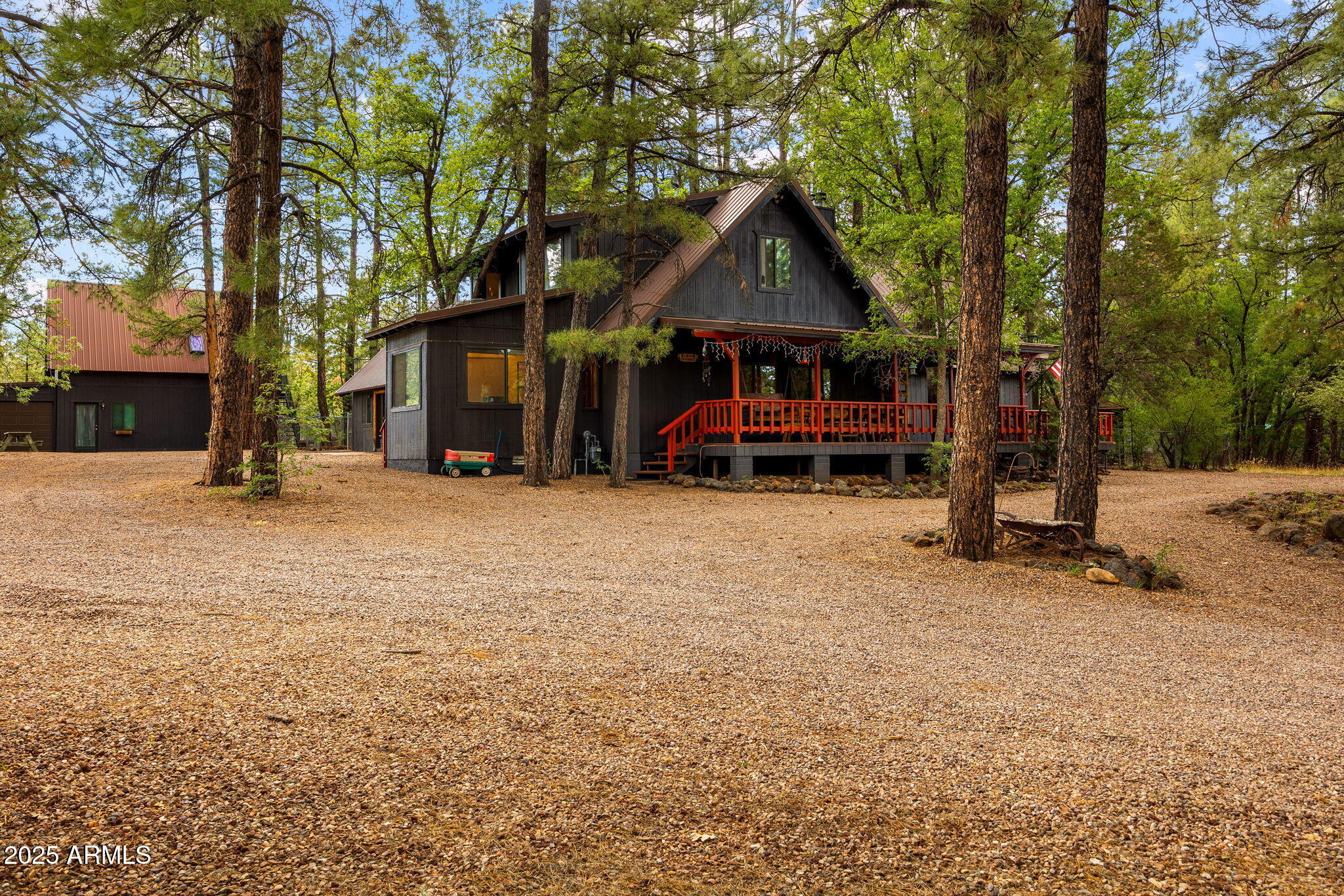 2444 South Jan Lane Pinetop, AZ 85935 - Photo 53 of 61 a front view of a house with a yard