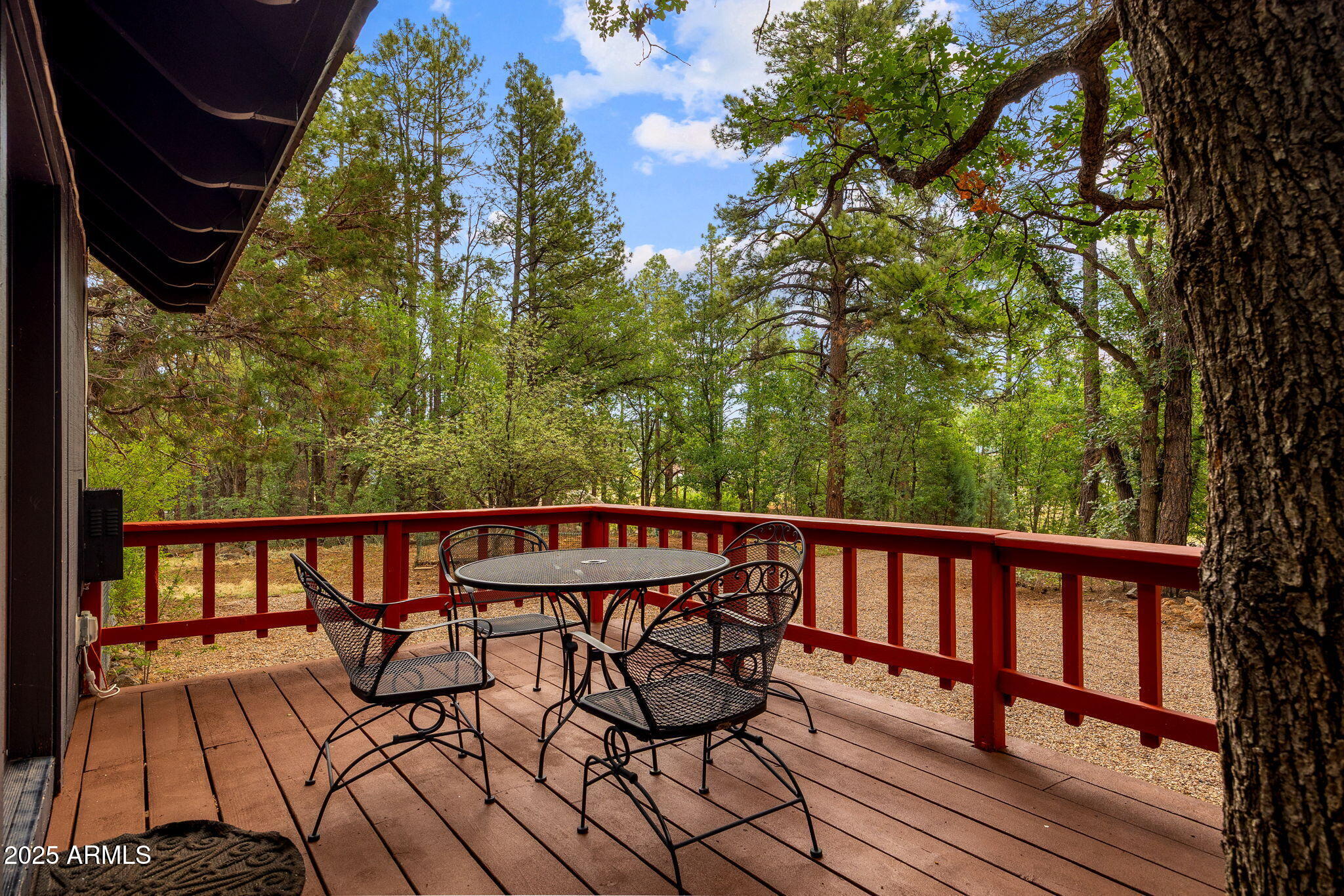 2444 South Jan Lane Pinetop, AZ 85935 - Photo 55 of 61 a view of a chairs and table on the wooden floor