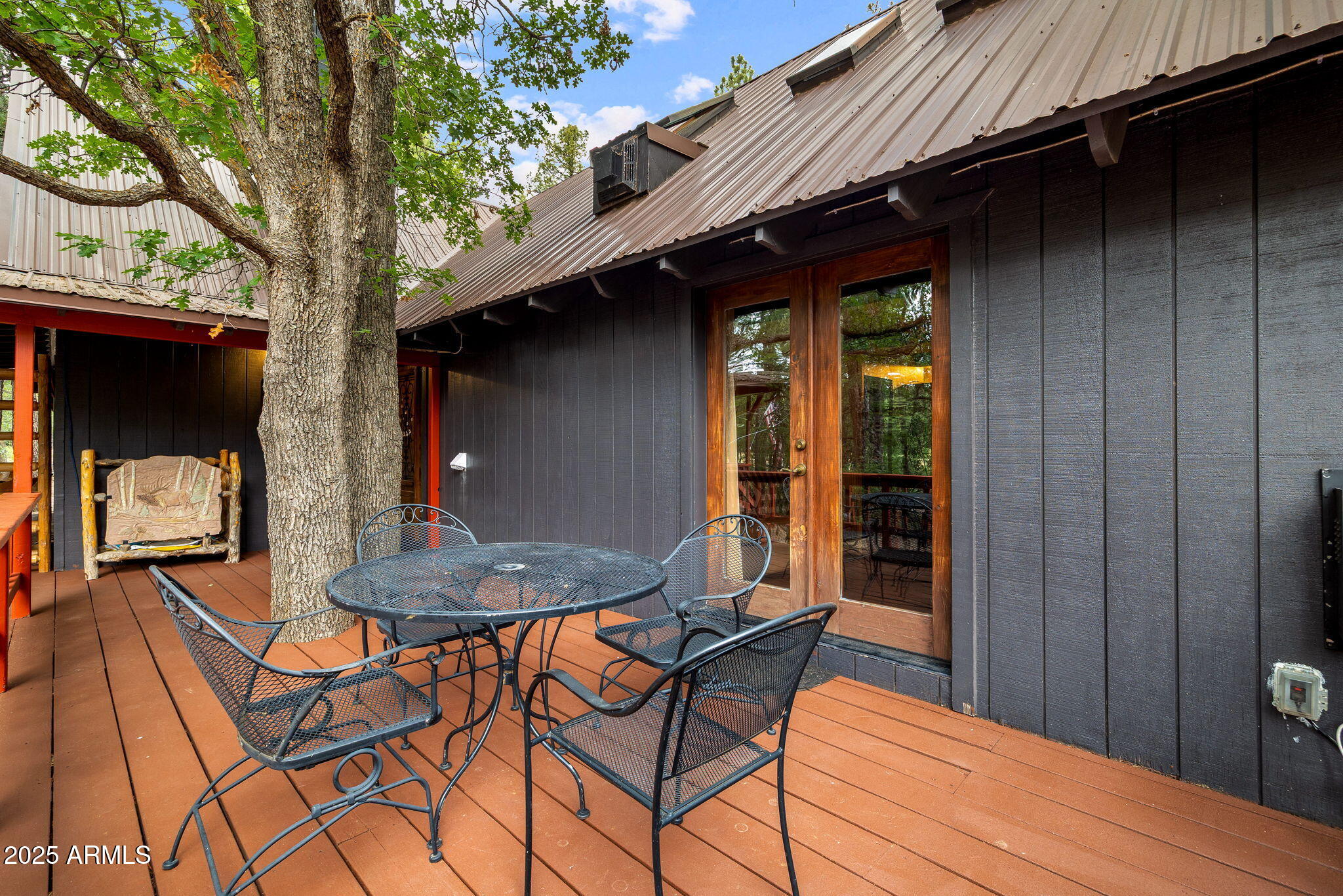 2444 South Jan Lane Pinetop, AZ 85935 - Photo 56 of 61 a backyard of a house with barbeque oven table and chairs