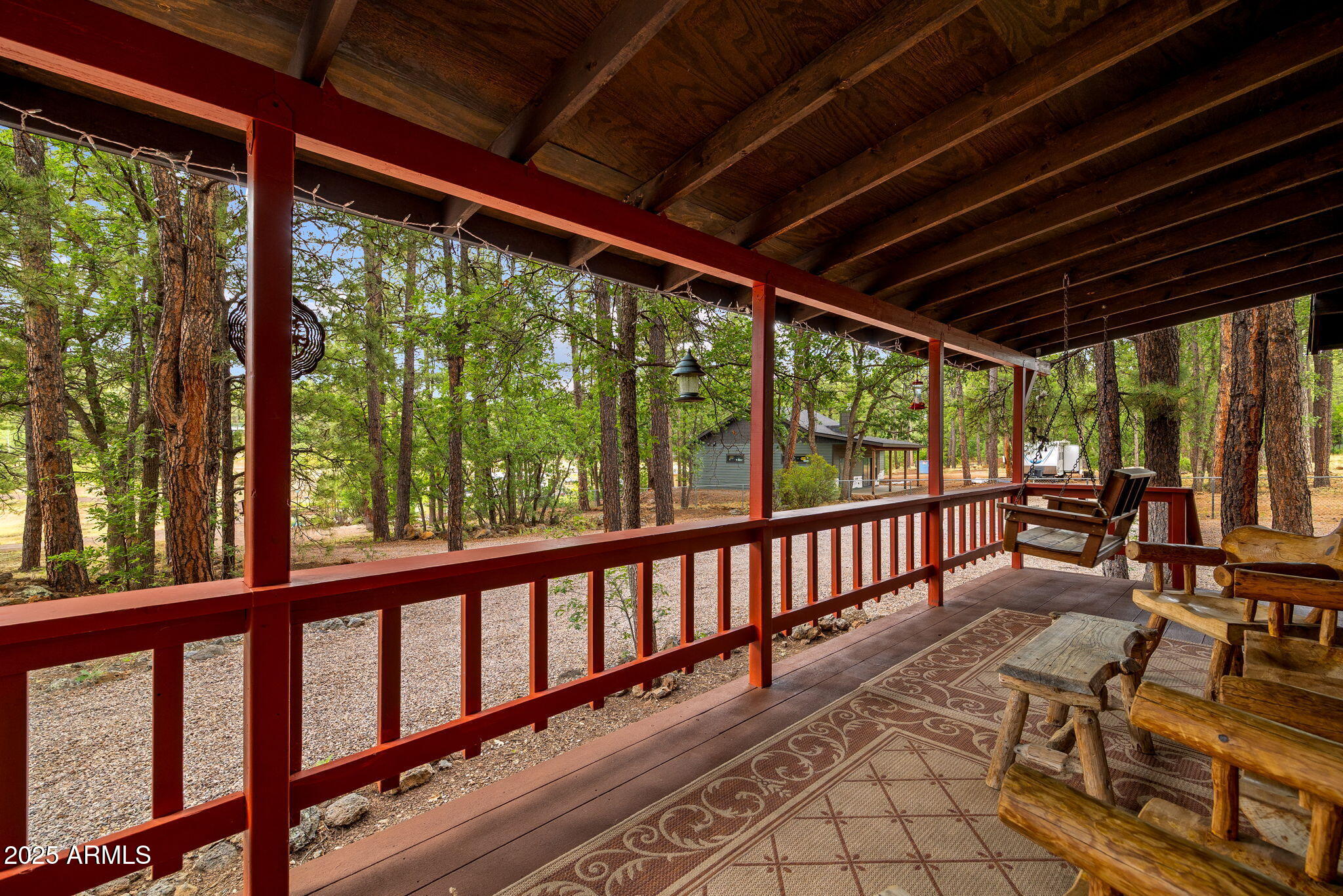 2444 South Jan Lane Pinetop, AZ 85935 - Photo 5 of 61 a view of porch with furniture and wooden floor