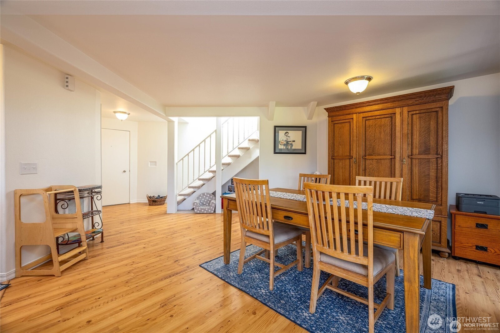 2877 North Nugent Road, Unit M4 Lummi Island, WA 98262 - Photo 11 of 31 a living room with furniture and a wooden floor