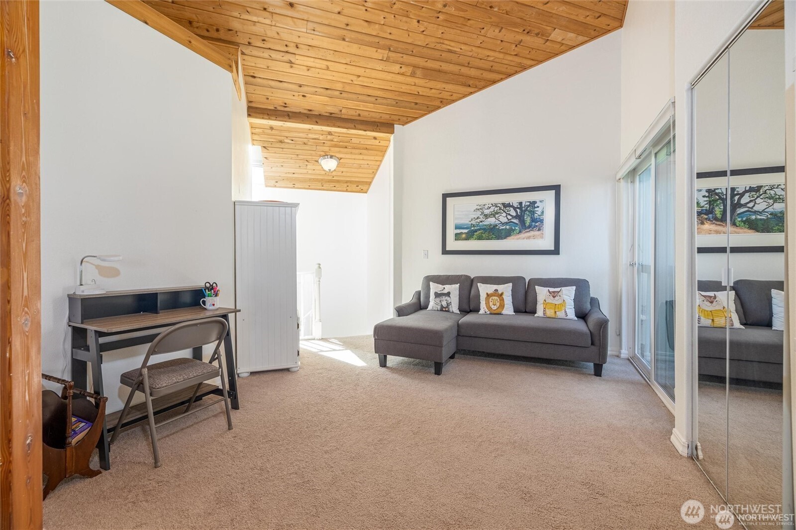 2877 North Nugent Road, Unit M4 Lummi Island, WA 98262 - Photo 12 of 31 a living room with furniture and a window