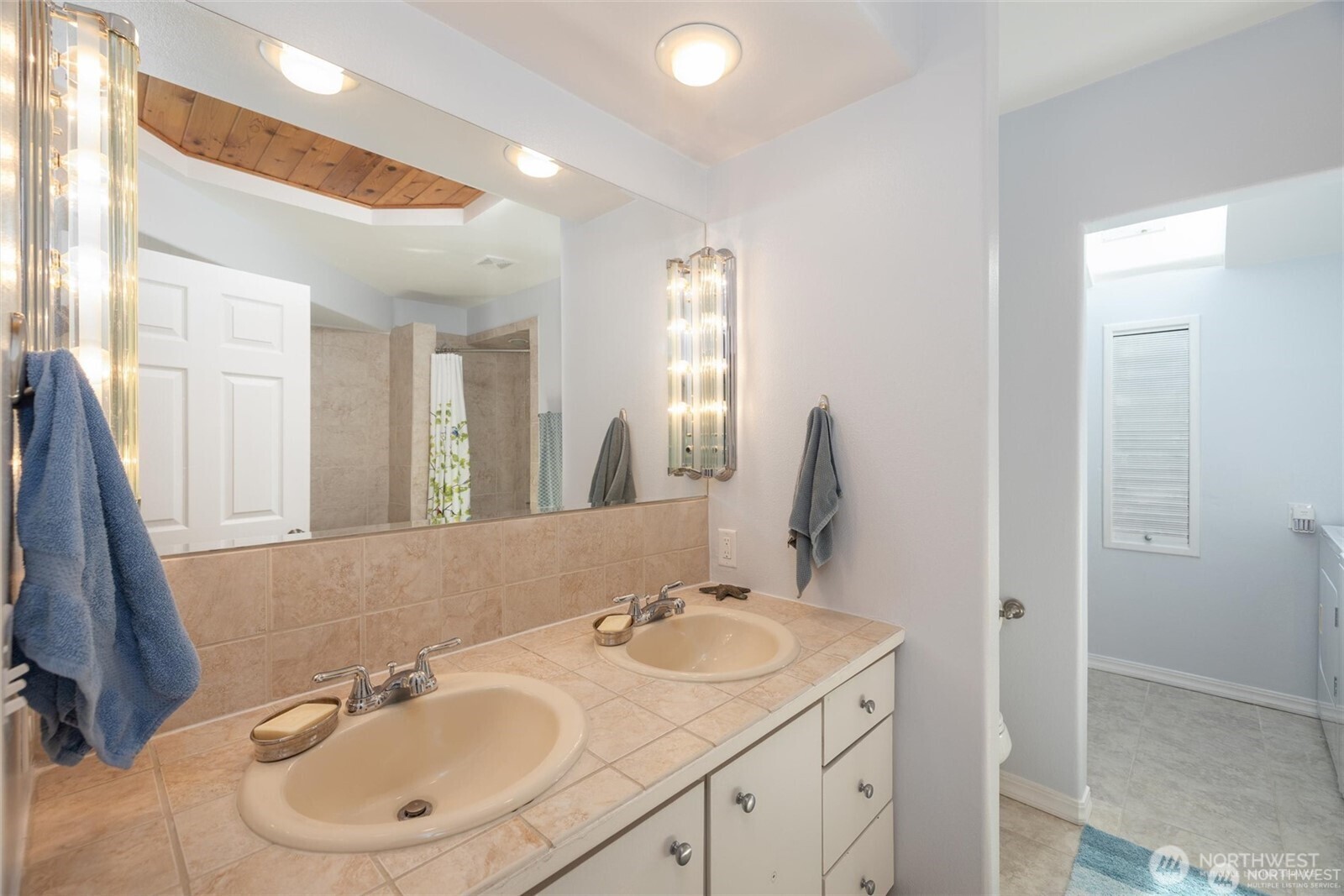 2877 North Nugent Road, Unit M4 Lummi Island, WA 98262 - Photo 16 of 31 a bathroom with a sink and a mirror