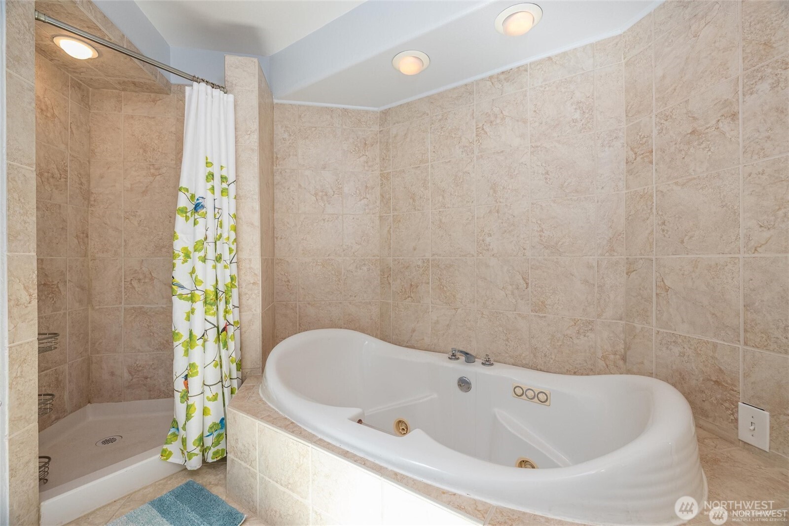 2877 North Nugent Road, Unit M4 Lummi Island, WA 98262 - Photo 17 of 31 a bathroom with a bathtub and shower