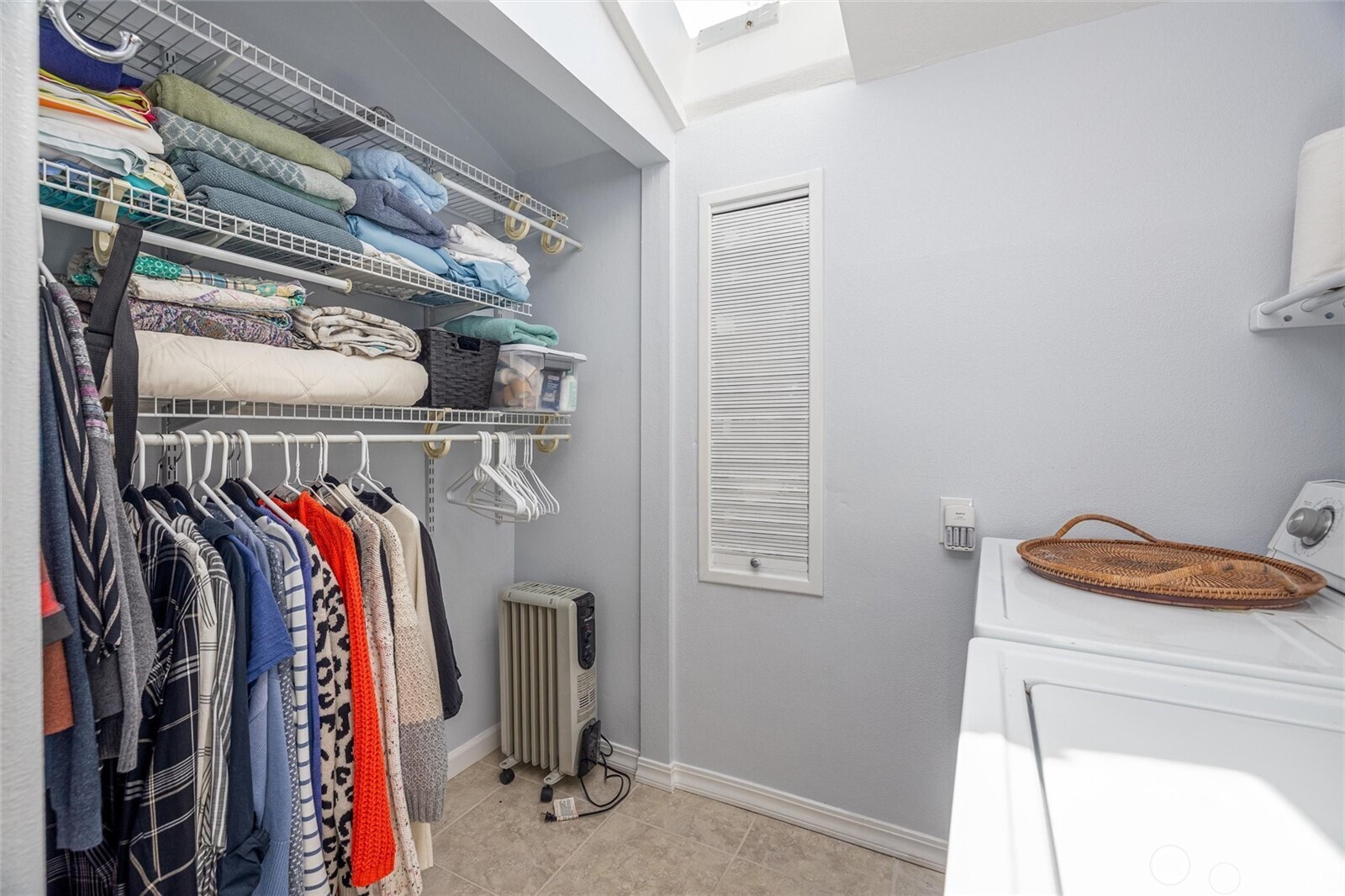2877 North Nugent Road, Unit M4 Lummi Island, WA 98262 - Photo 18 of 31 a view of walk in closet with clothes and shoes