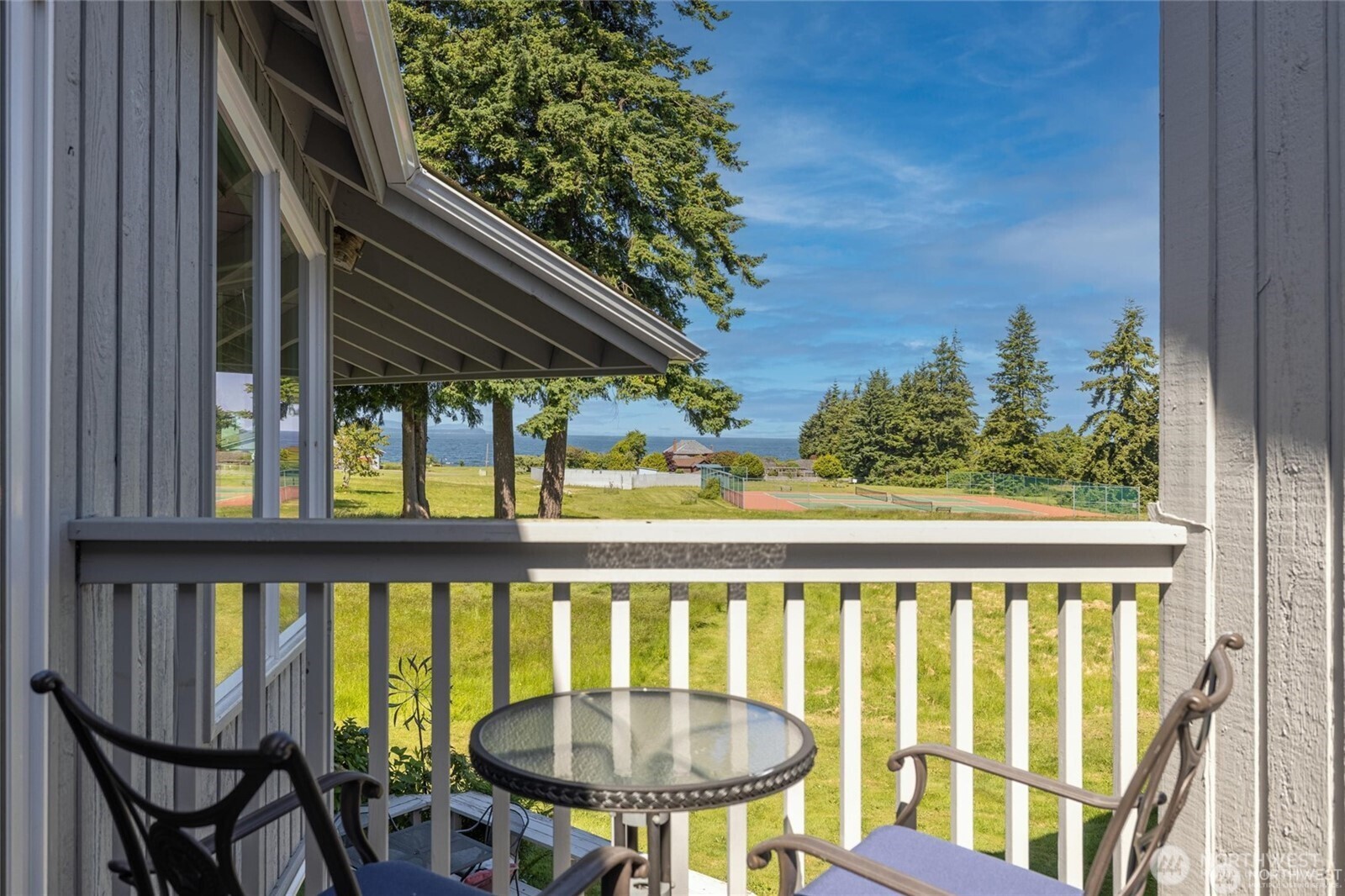 2877 North Nugent Road, Unit M4 Lummi Island, WA 98262 - Photo 19 of 31 a view of a chair and table in the balcony
