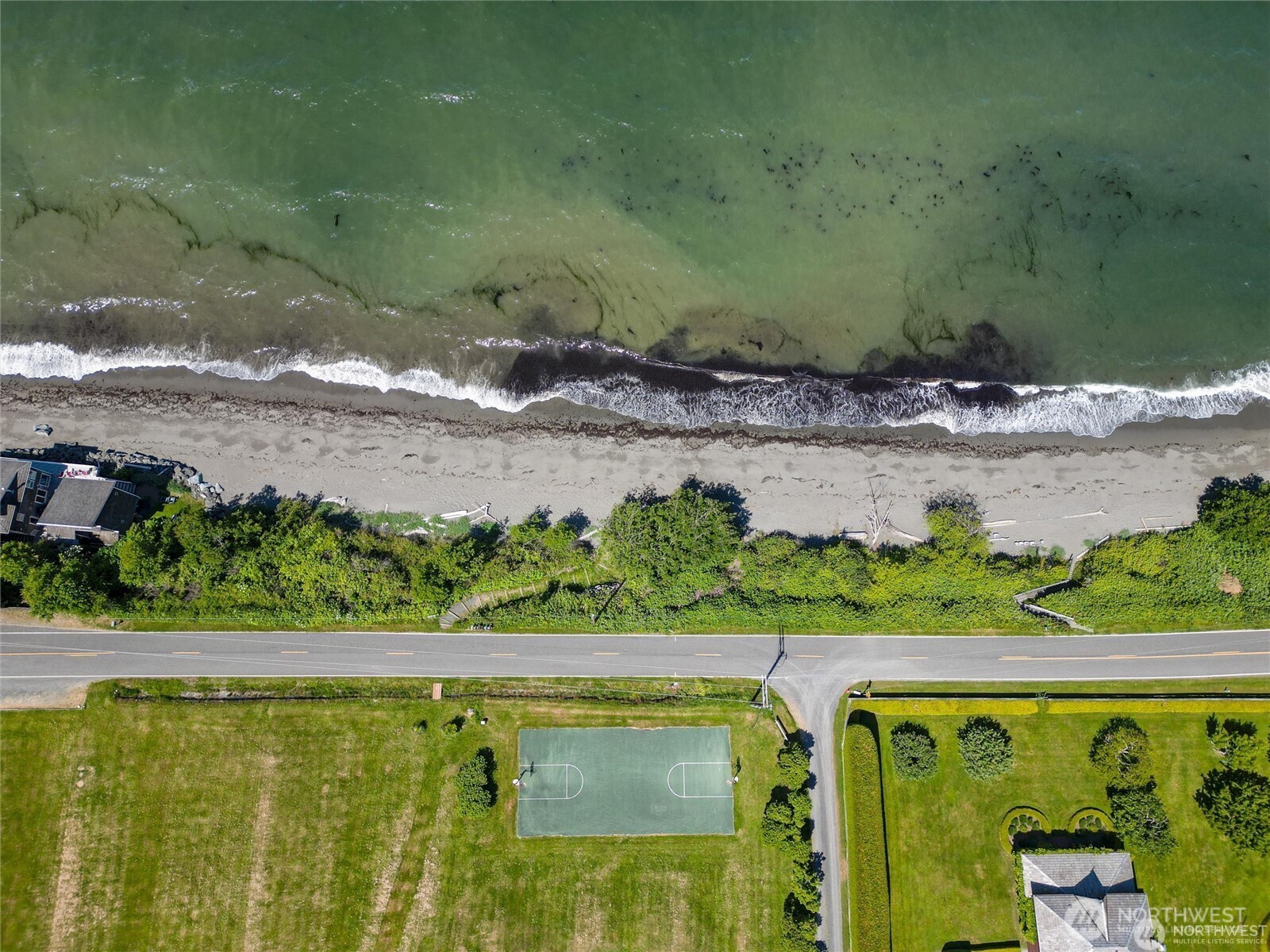 2877 North Nugent Road, Unit M4 Lummi Island, WA 98262 - Photo 31 of 31 an aerial view of a garden with an outdoor space