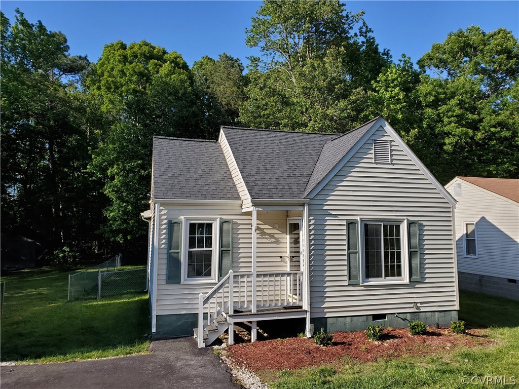 front view of a house with a yard