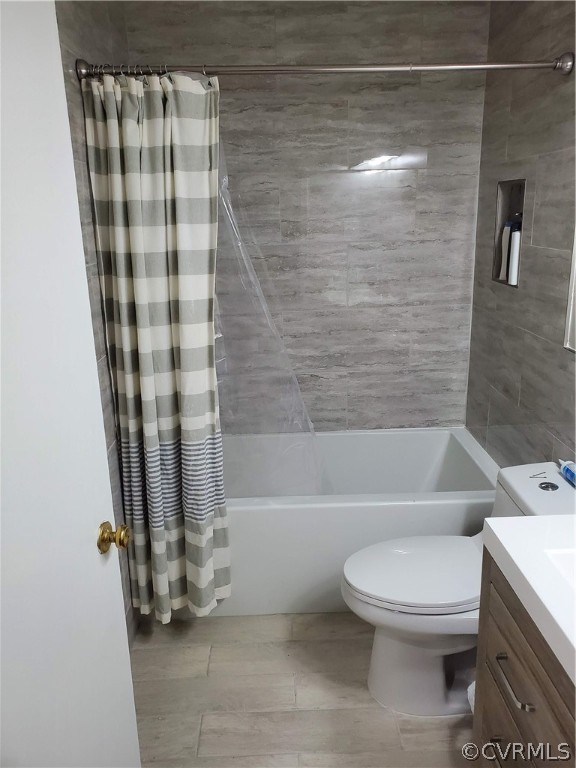 12306 Duck River Road Midlothian, VA 23112 - Photo 2 of 3 a bathroom with a toilet and a bathtub