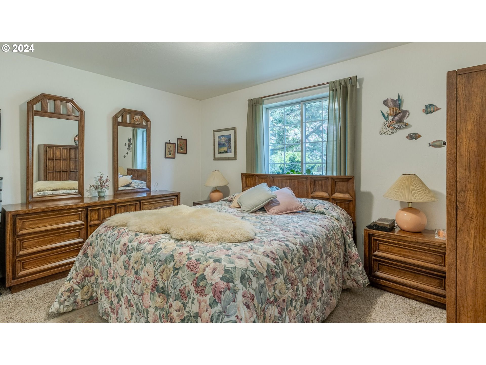 1450 Bogart Lane Eugene, OR 97401 - Photo 21 of 34 a bedroom with a bed and a dresser