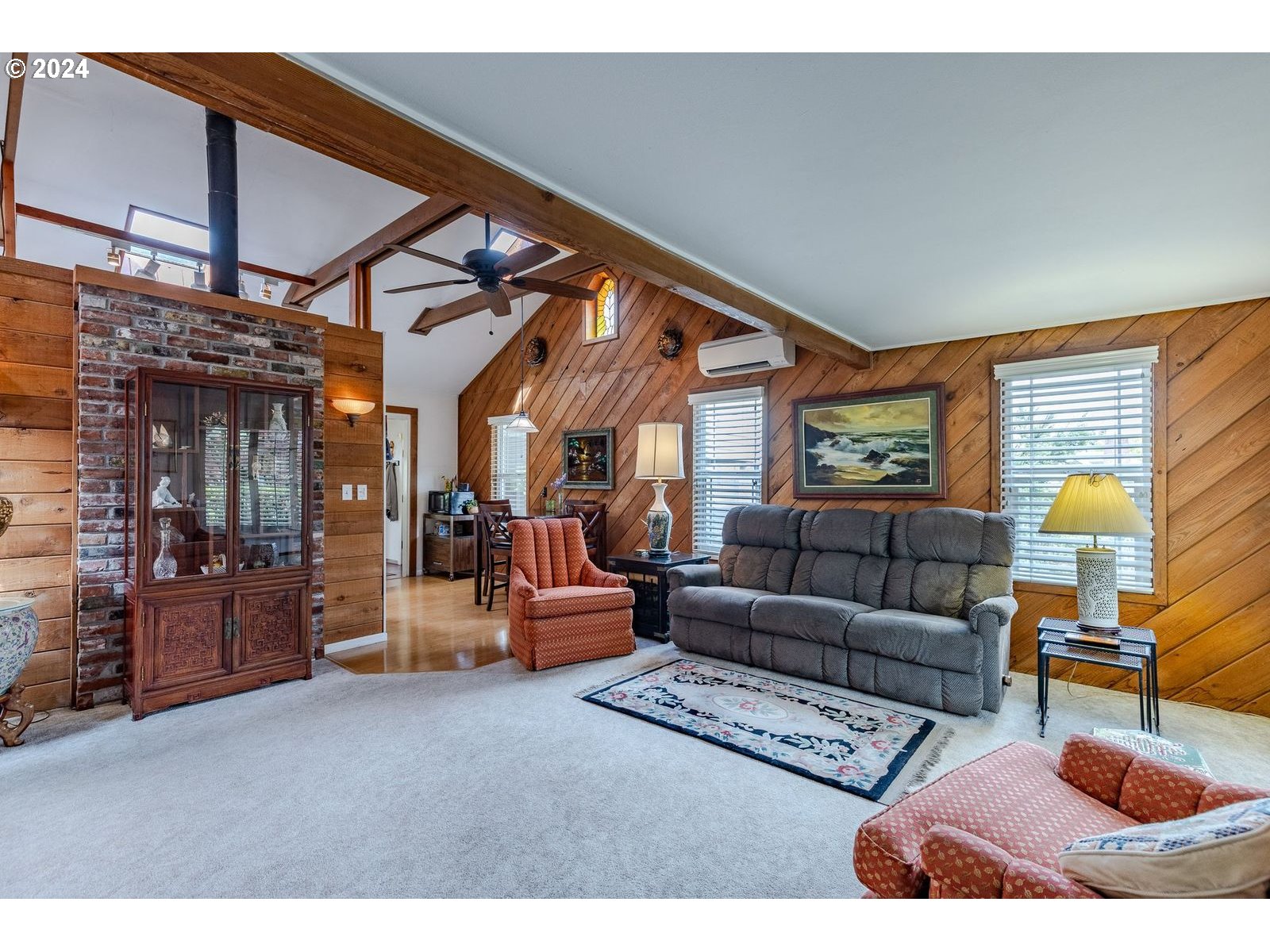1450 Bogart Lane Eugene, OR 97401 - Photo 5 of 34 a living room with furniture a rug and a window