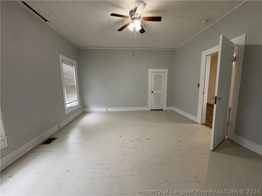 3174 Lindsay Road Raeford, NC 28376 - Photo 14 of 28 a view of an empty room with a window