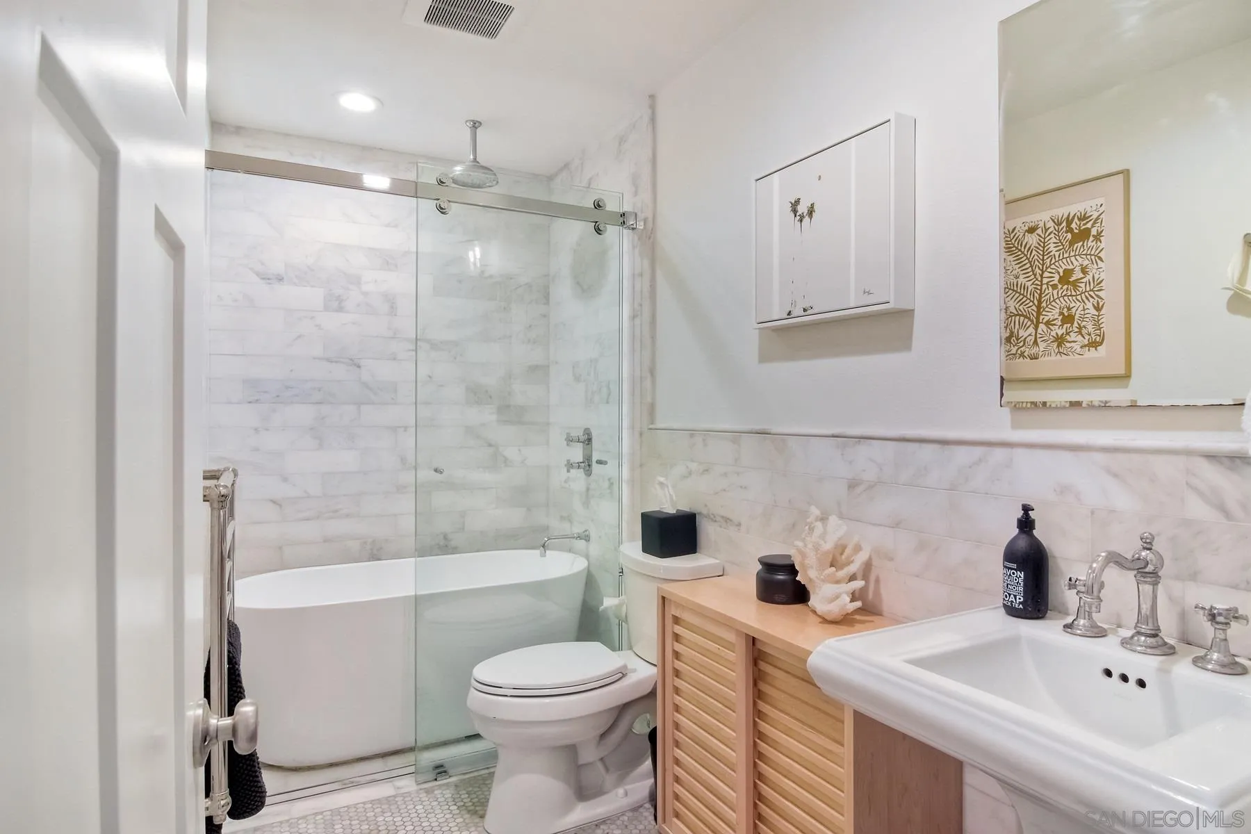 1161 Balour Drive Encinitas, CA 92024 - Photo 11 of 26 a bathroom with a sink toilet and shower
