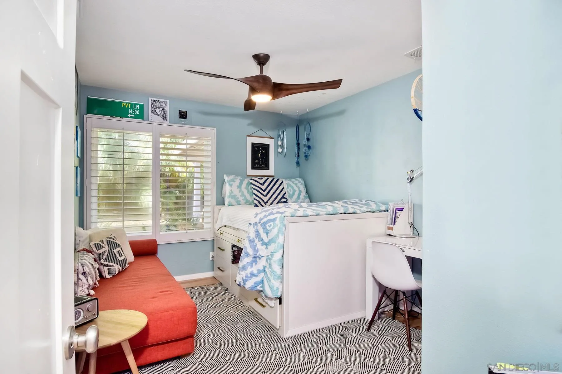 1161 Balour Drive Encinitas, CA 92024 - Photo 12 of 26 a bedroom with a bed and a window