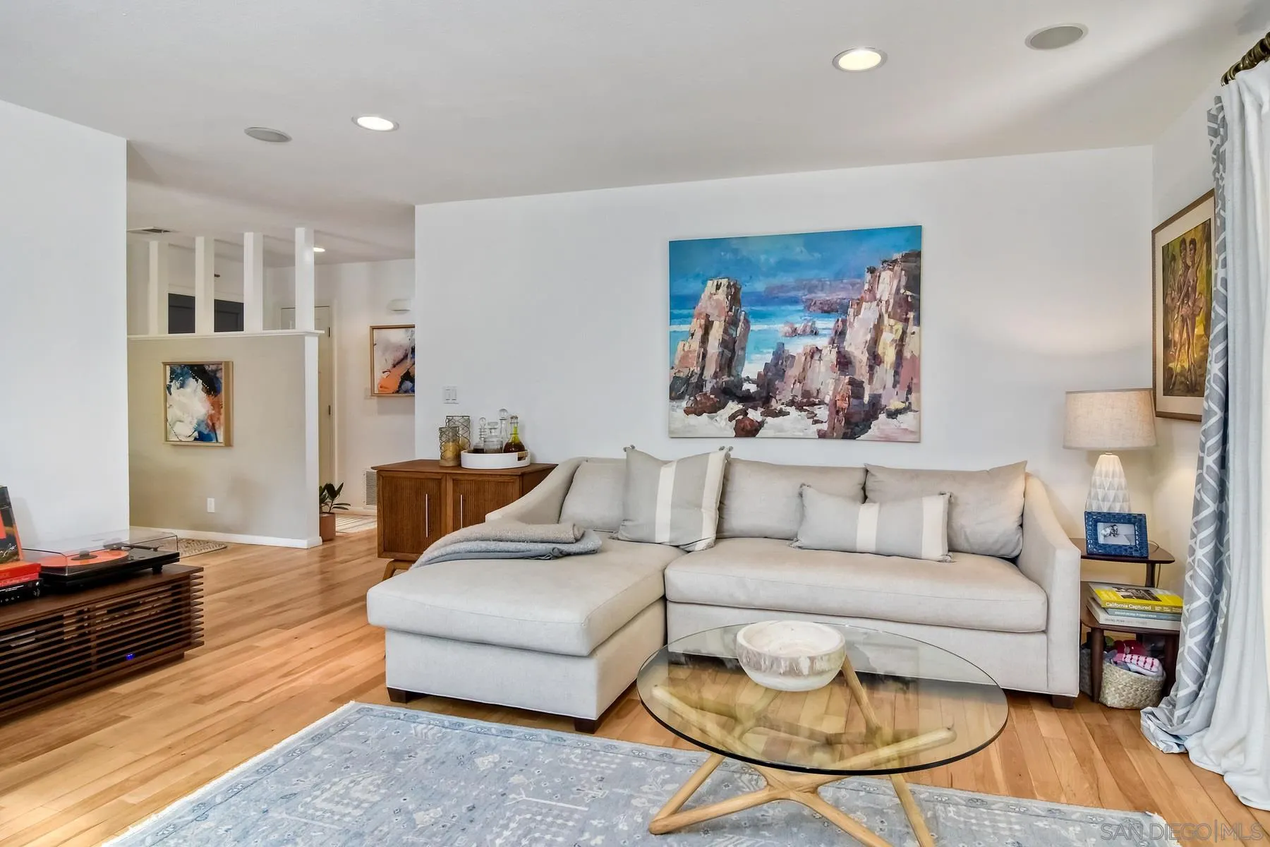 1161 Balour Drive Encinitas, CA 92024 - Photo 16 of 26 a living room with furniture and a wooden floor
