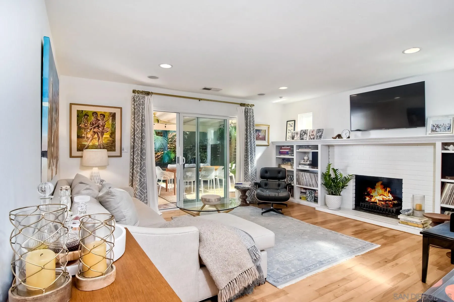 1161 Balour Drive Encinitas, CA 92024 - Photo 17 of 26 a living room with furniture and a fireplace