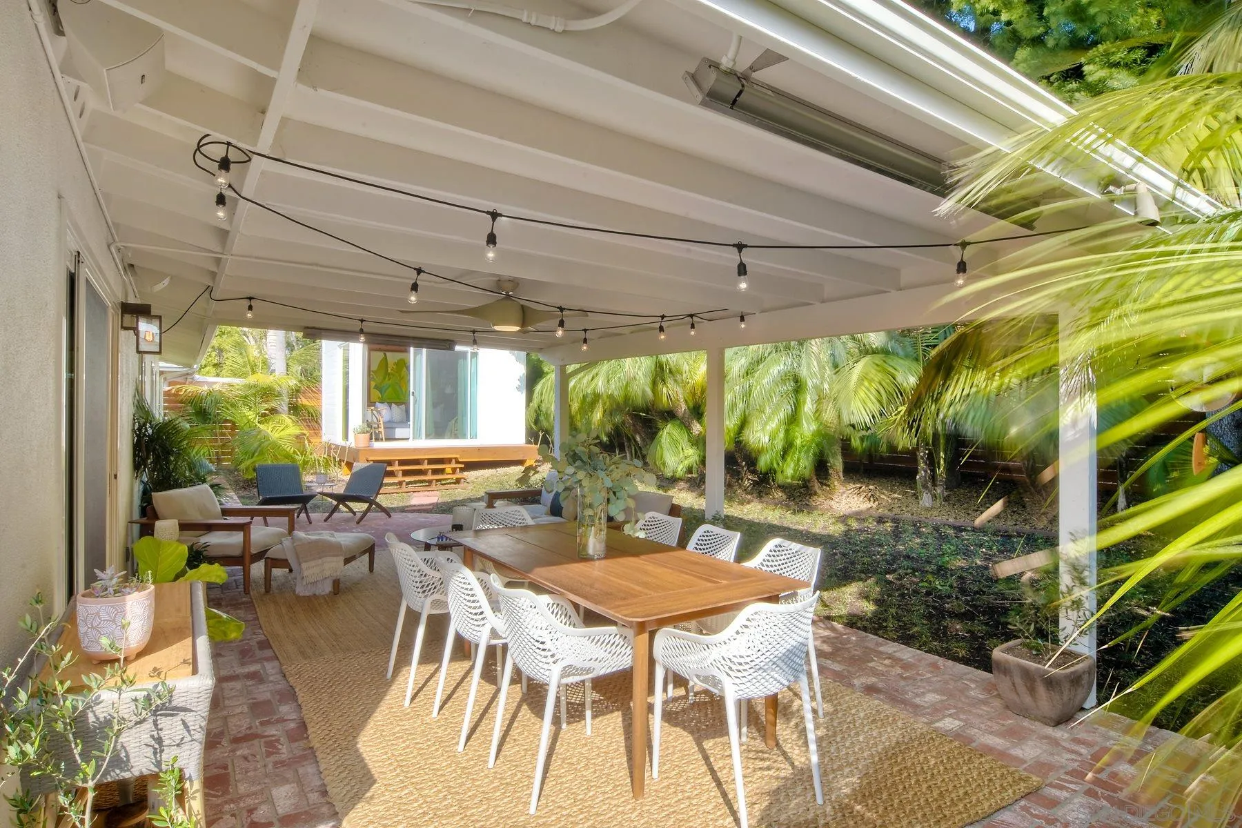 1161 Balour Drive Encinitas, CA 92024 - Photo 23 of 26 a view of a patio with table and chairs and potted plants