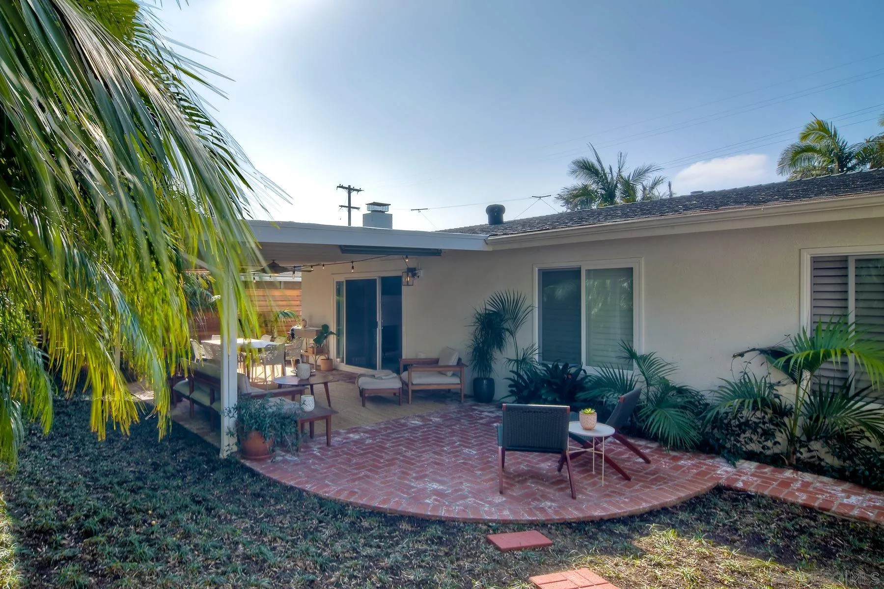 1161 Balour Drive Encinitas, CA 92024 - Photo 25 of 26 a view of a house with backyard sitting area and garden