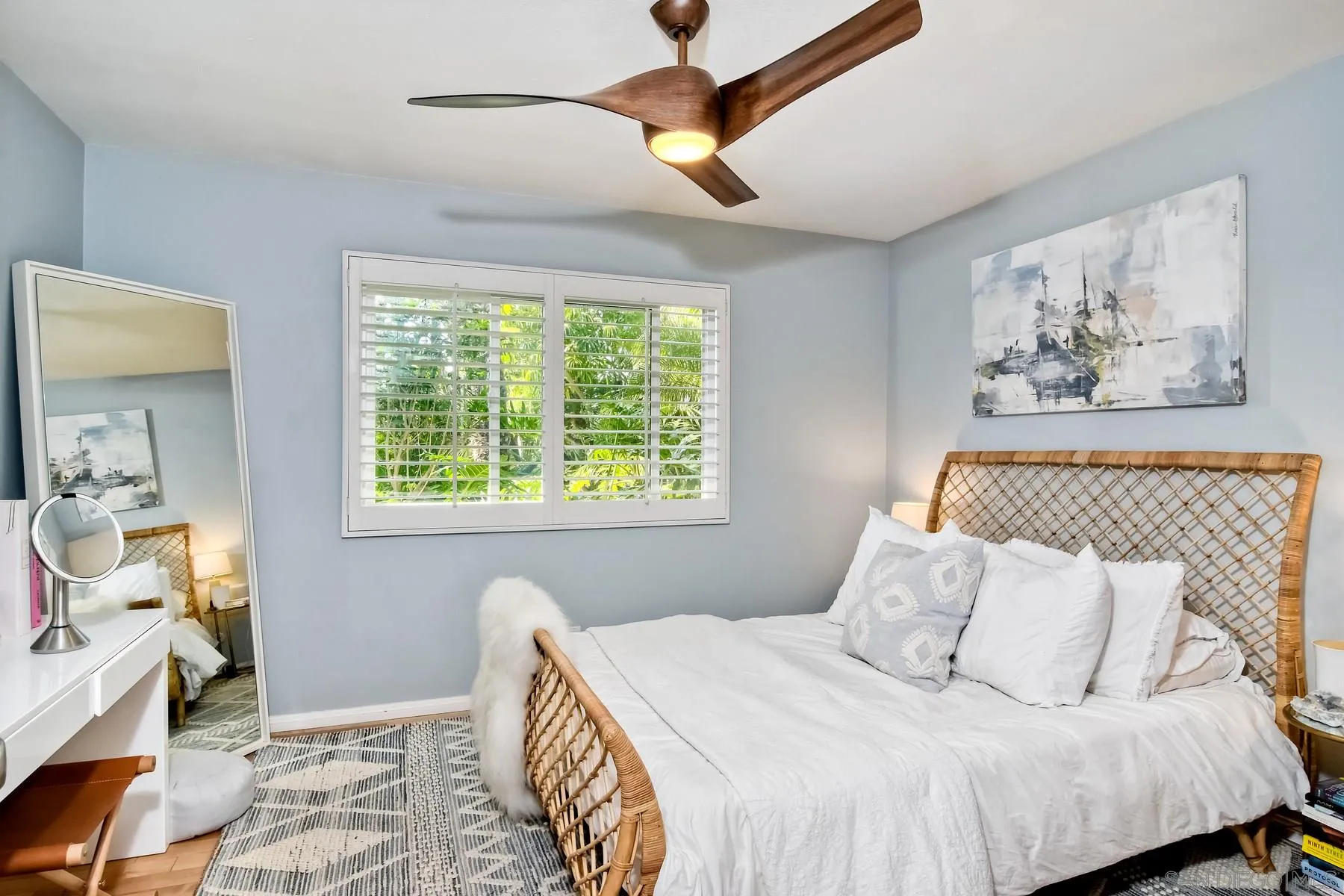 1161 Balour Drive Encinitas, CA 92024 - Photo 8 of 26 a bedroom with a bed and a window