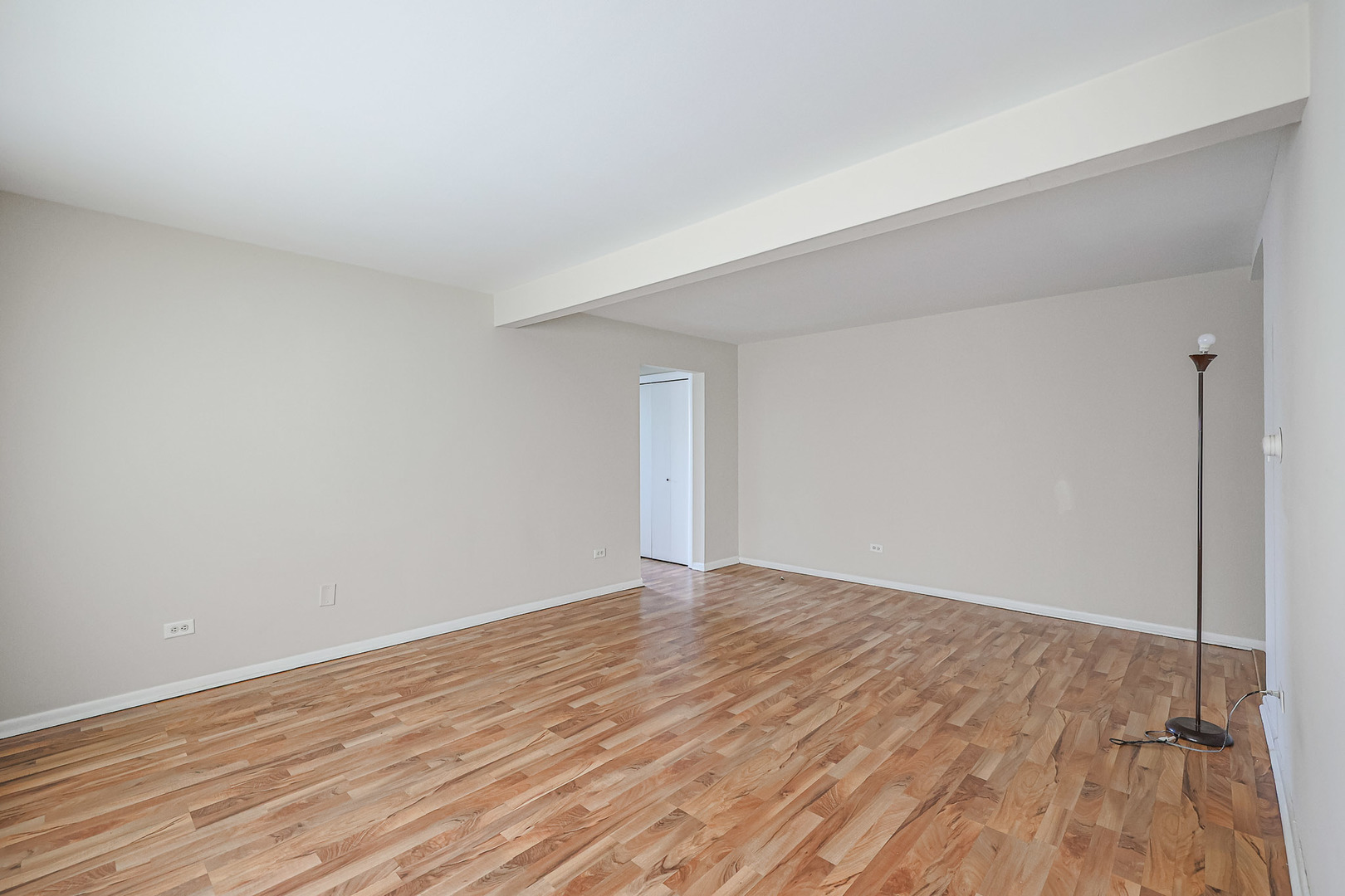 10016 South Pulaski Road, Unit 3 Oak Lawn, IL 60453 - Photo 11 of 39 a view of an empty room and wooden floor