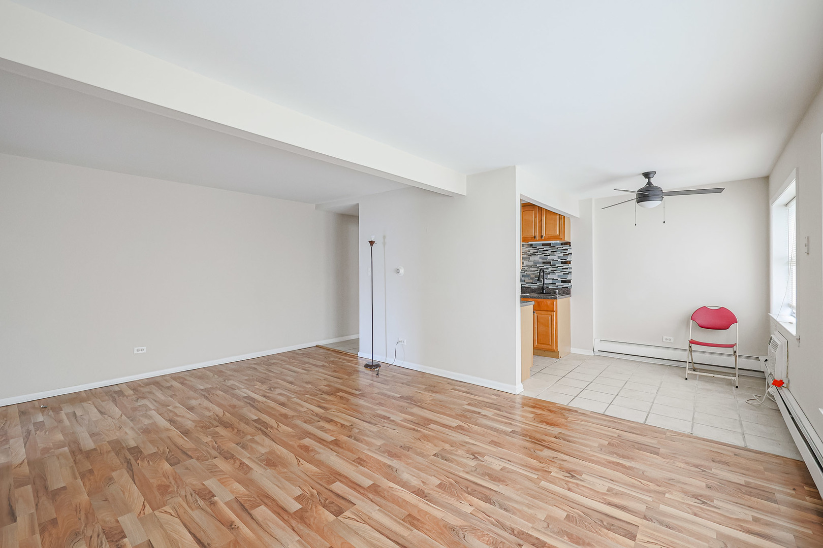 10016 South Pulaski Road, Unit 3 Oak Lawn, IL 60453 - Photo 12 of 39 a view of an empty room and window