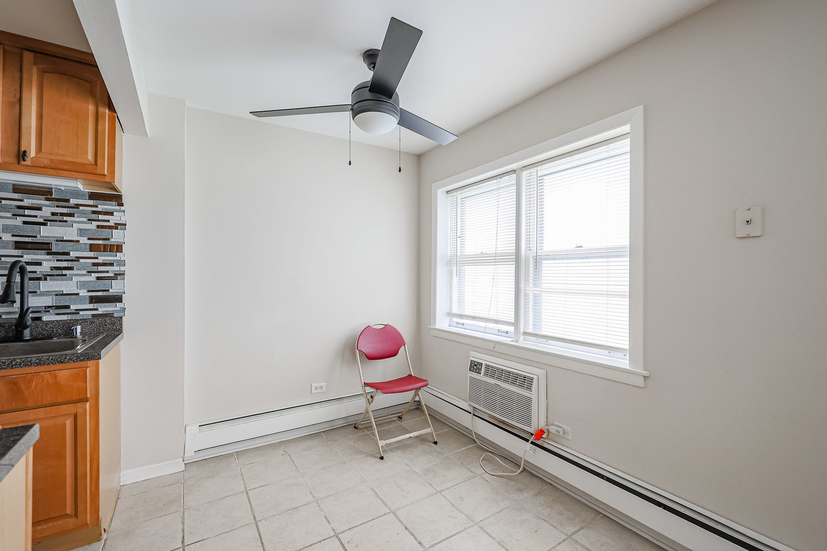 10016 South Pulaski Road, Unit 3 Oak Lawn, IL 60453 - Photo 15 of 39 a living room with a window
