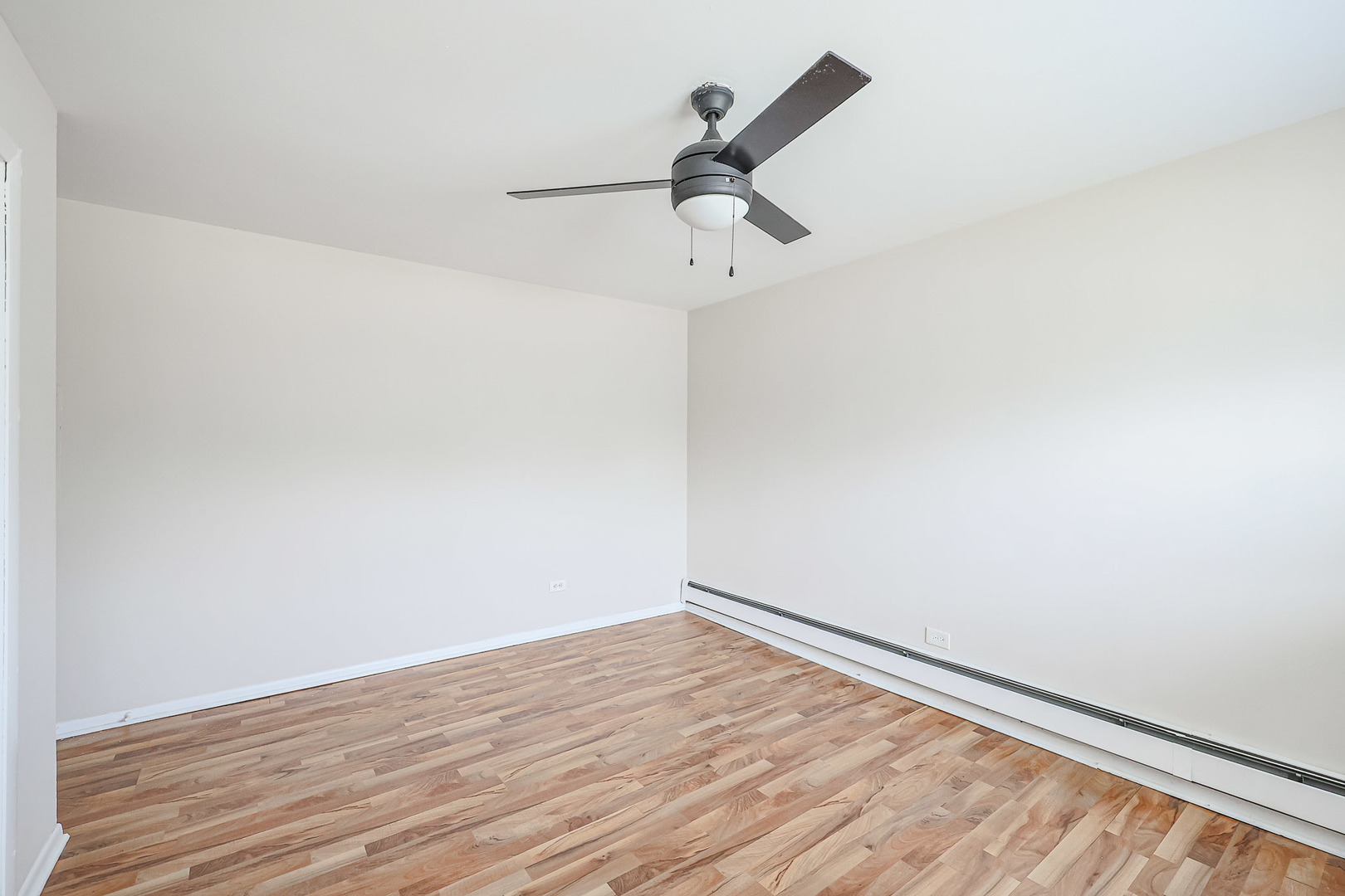 10016 South Pulaski Road, Unit 3 Oak Lawn, IL 60453 - Photo 27 of 39 a view of a room with wooden floor