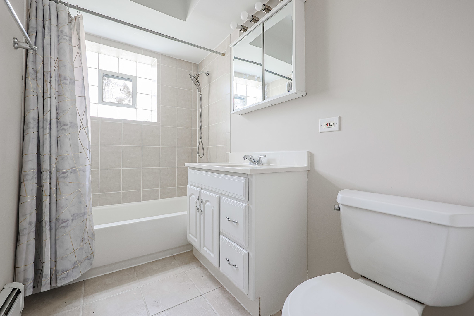 10016 South Pulaski Road, Unit 3 Oak Lawn, IL 60453 - Photo 30 of 39 a bathroom with a sink a toilet and bathtub