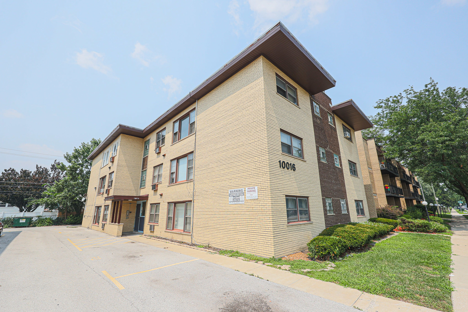 10016 South Pulaski Road, Unit 3 Oak Lawn, IL 60453 - Photo 3 of 39 a view of a house with a yard
