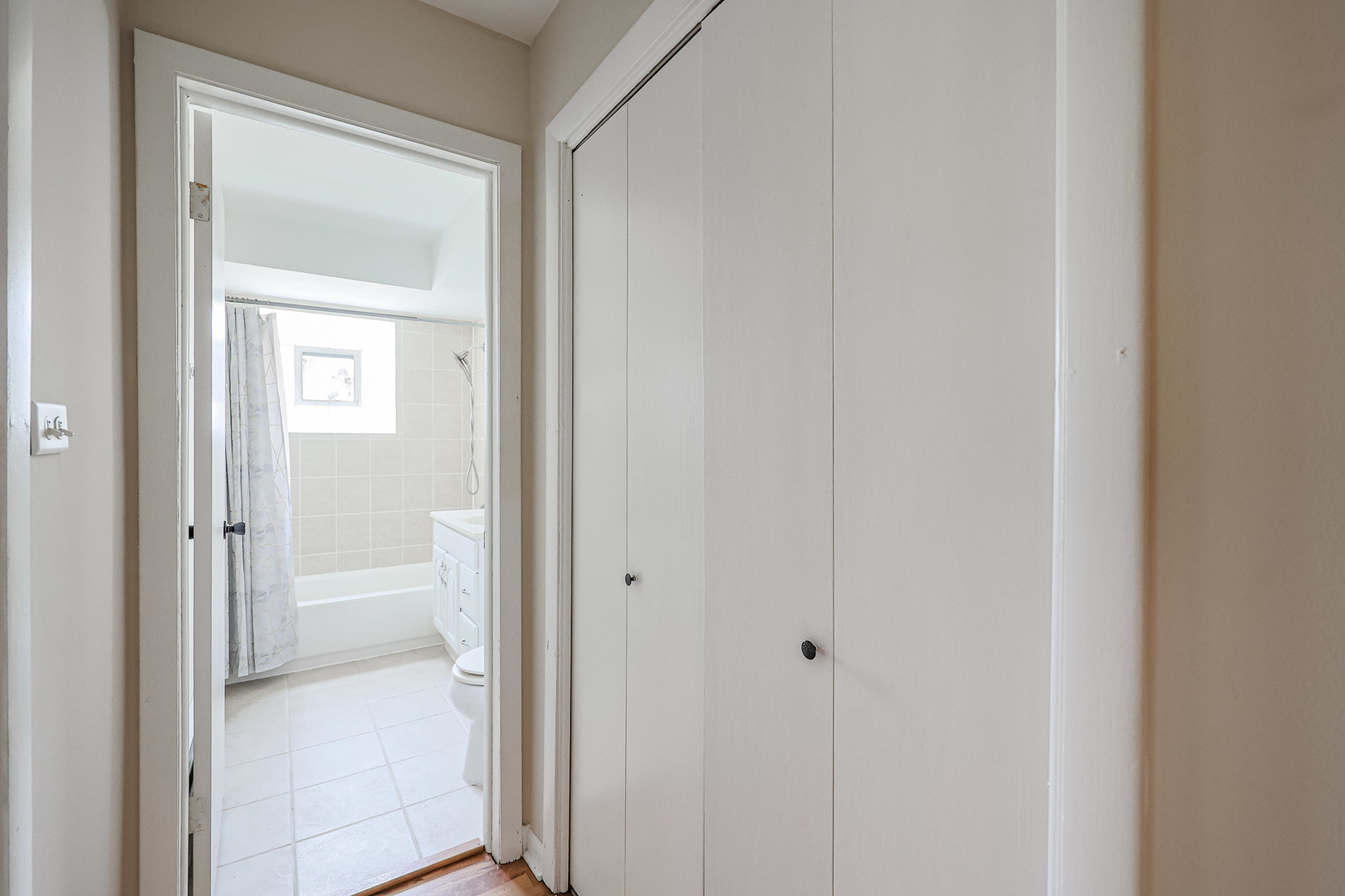10016 South Pulaski Road, Unit 3 Oak Lawn, IL 60453 - Photo 32 of 39 a view of a bathroom from a hallway