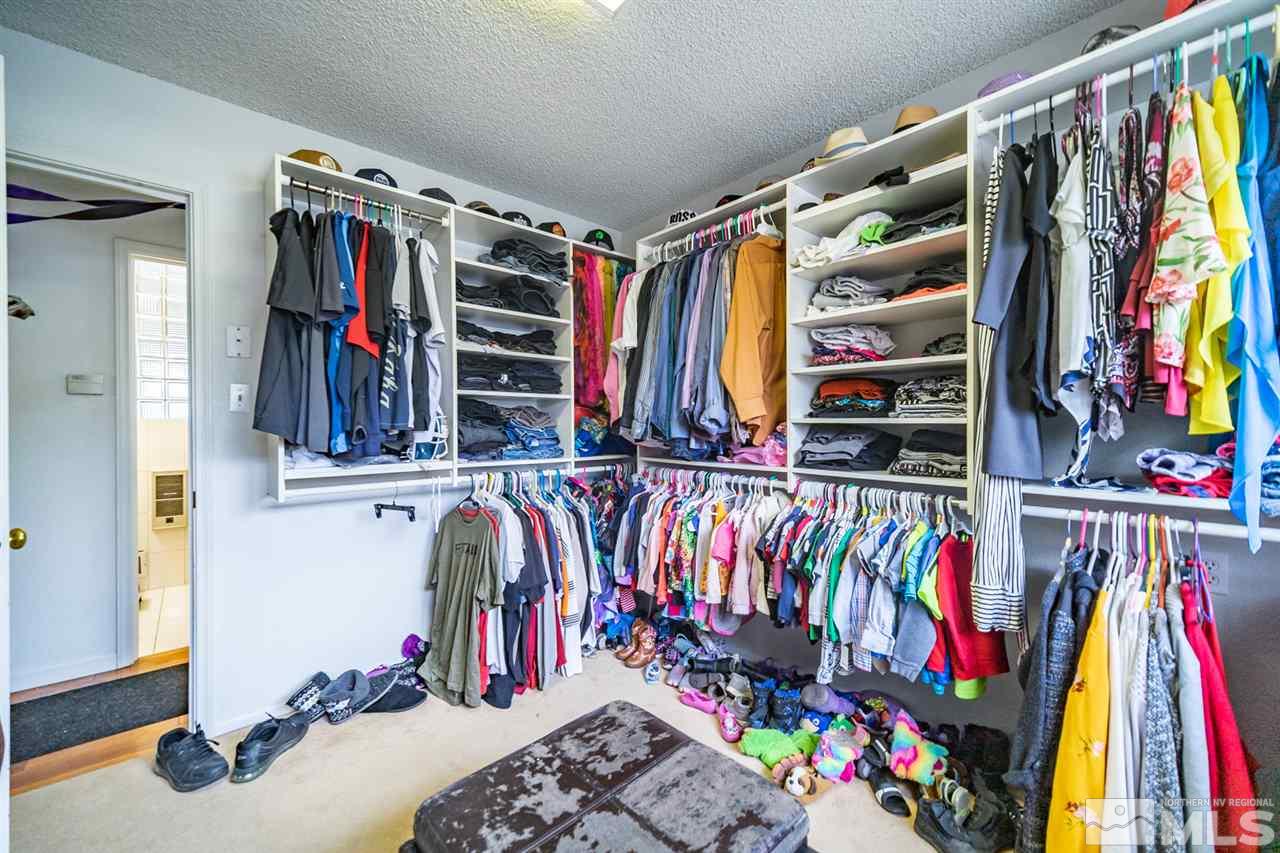960 Keystone Avenue Reno, NV 89503 - Photo 32 of 40 a view of walk in closet with clothes and shoes