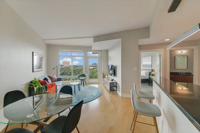 a view of a dining room with furniture window and outside view
