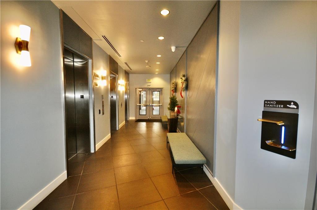 603 Davis Street, Unit 712 Austin, TX 78701 - Photo 16 of 22 a hallway with a view of a hallway