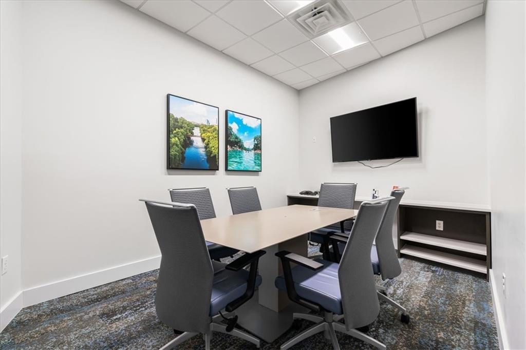 603 Davis Street, Unit 712 Austin, TX 78701 - Photo 21 of 22 a view of a dining room with furniture