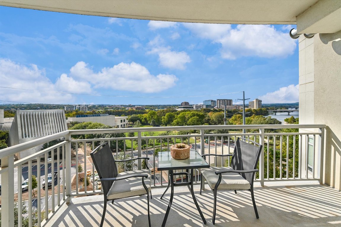 603 Davis Street, Unit 712 Austin, TX 78701 - Photo 6 of 22 a view of a chairs and table on the terrace