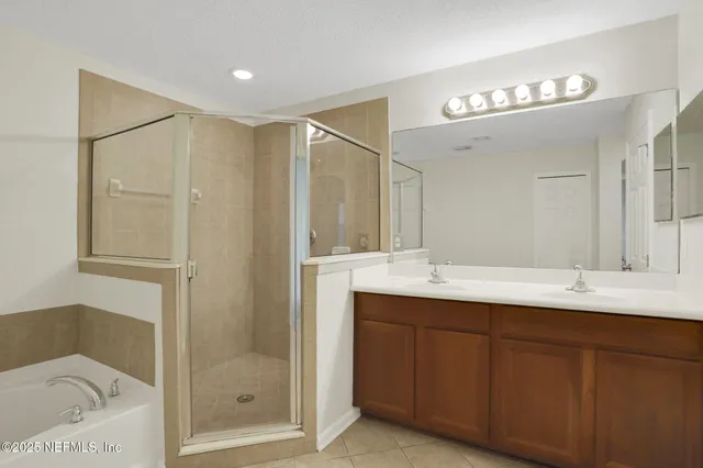 a view of multiple houses with a yard