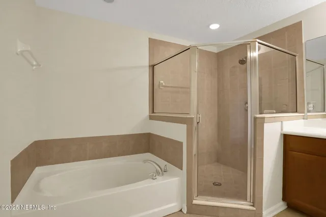 a view of swimming pool with chairs