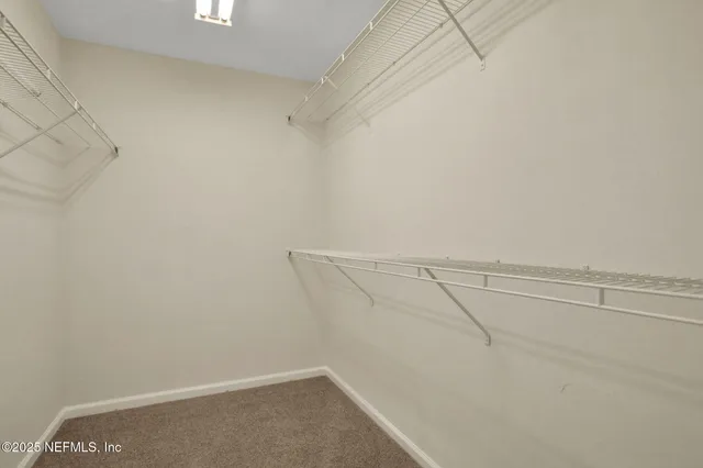 a view of a park with swings and slides