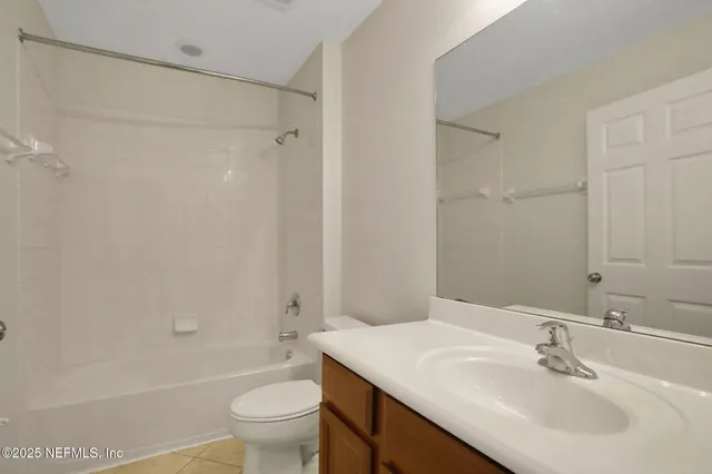 a view of a field with a big yard