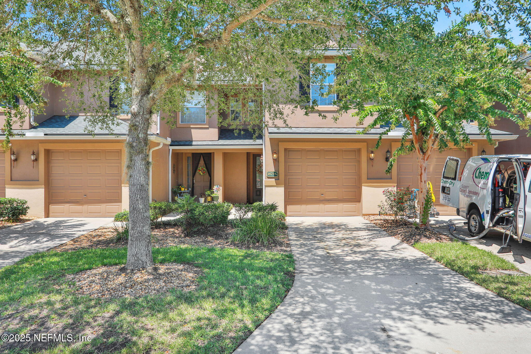 3875 Buckthorne Drive, Unit C Orange Park, FL 32065 - Photo 4 of 70 a front view of a house with garden