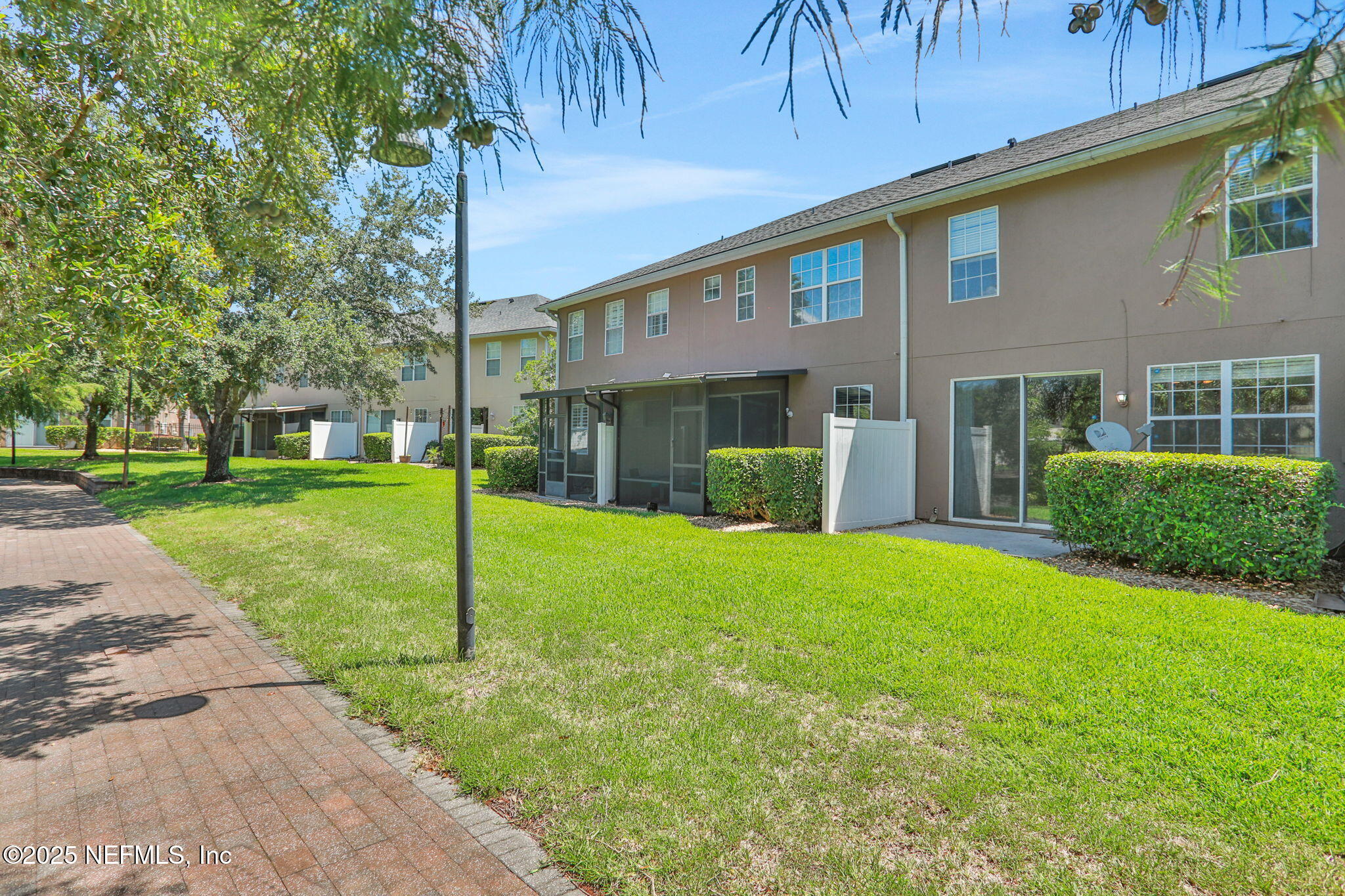 3875 Buckthorne Drive, Unit C Orange Park, FL 32065 - Photo 42 of 70 a view of a house with a yard
