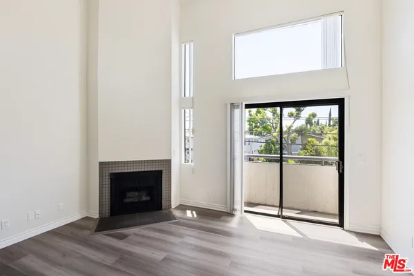 a view of a livingroom with a fireplace
