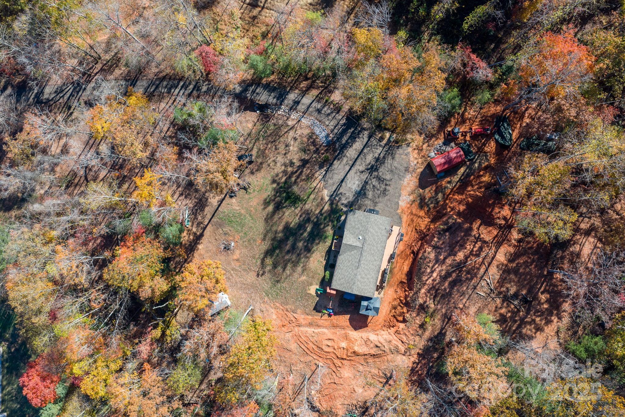 2603 Setzers Gap Road Lenoir, NC 28645 - Photo 28 of 29 a backyard of a house with lots of green space