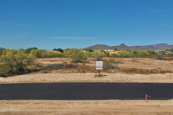 a view of mountain with sunset